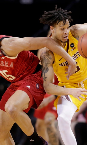 Palmer’s last-second FTs lift Huskers over Gophers 62-61